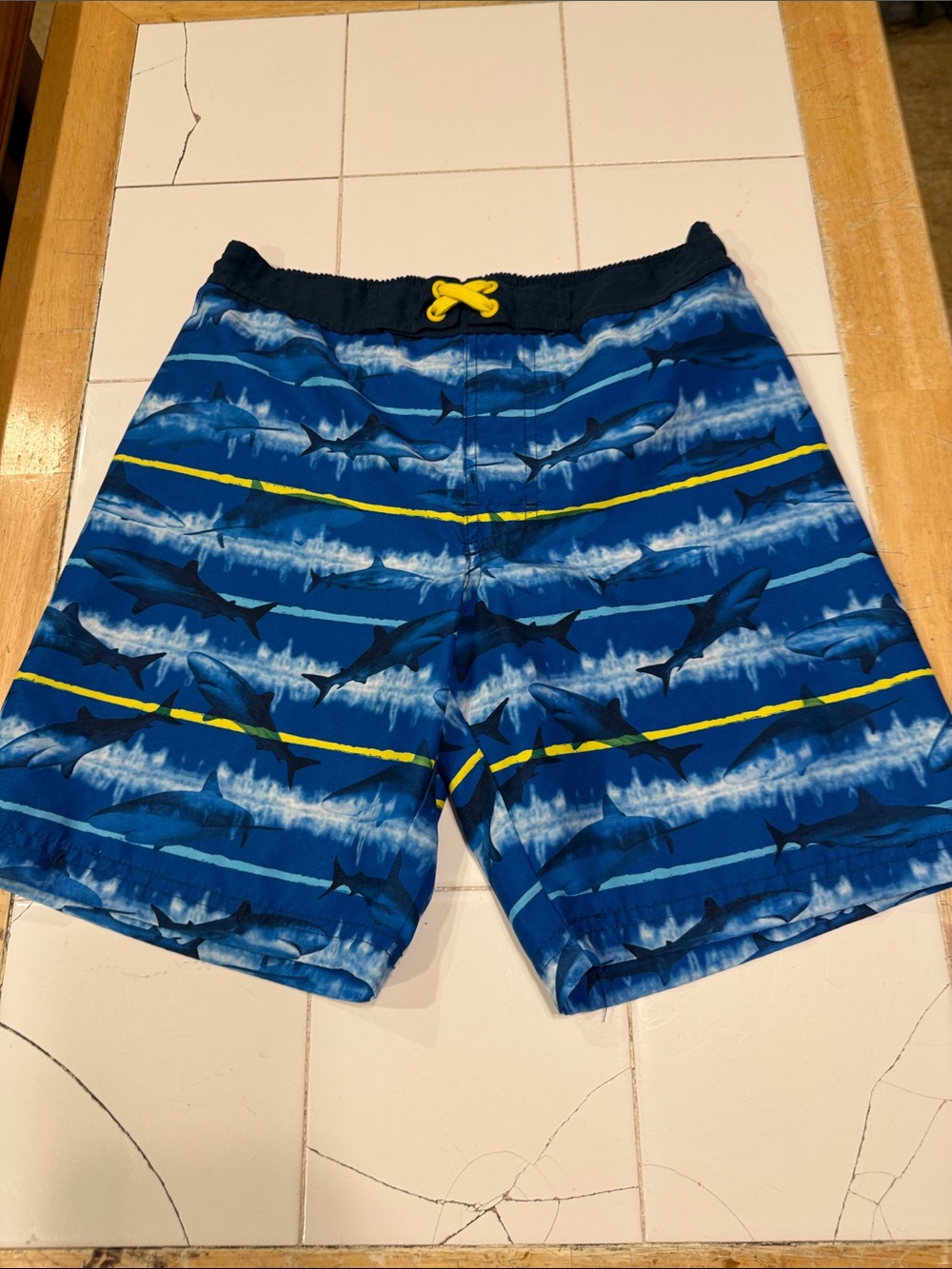 Kids Blue Shark-Print Swim Trunks with Yellow Drawstring